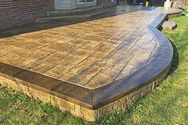 St. Thomas stamped patio after cleaning and gloss sealing