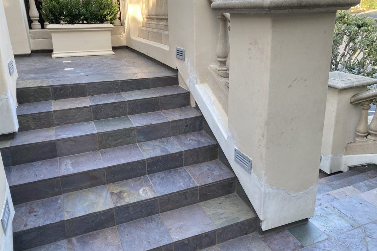 Stamped concrete porch steps with a sealed finish